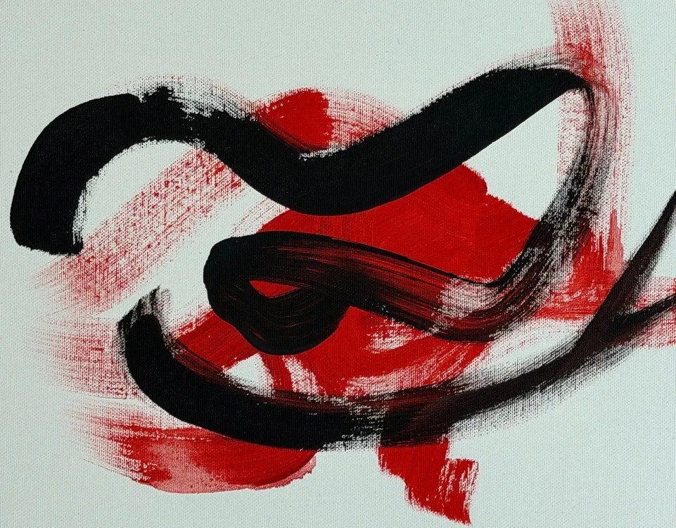 Broad black calligraphic strokes and red gestures on a white canvas.